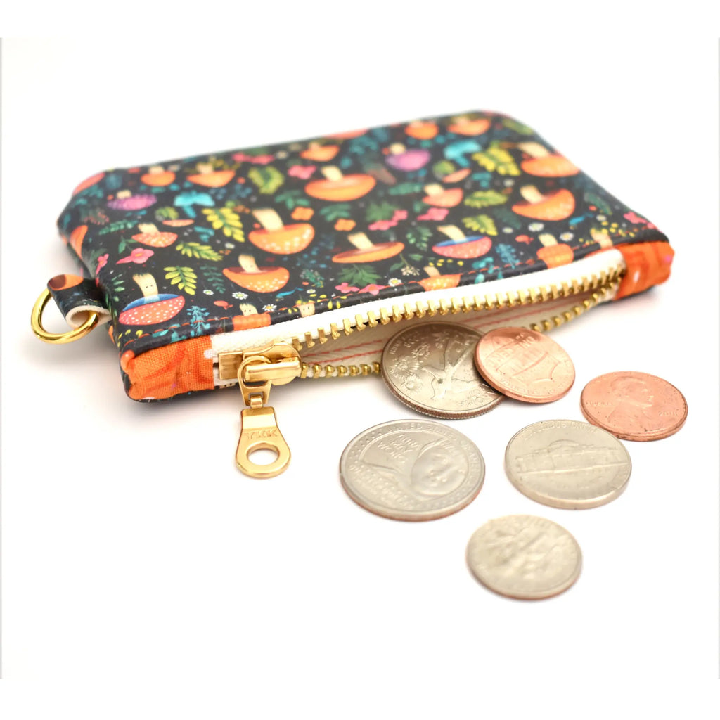 mushroom Coin purse with colorful mushroom pattern on a white background