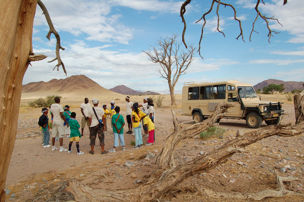 Campers in a circle in the desert in Namibia