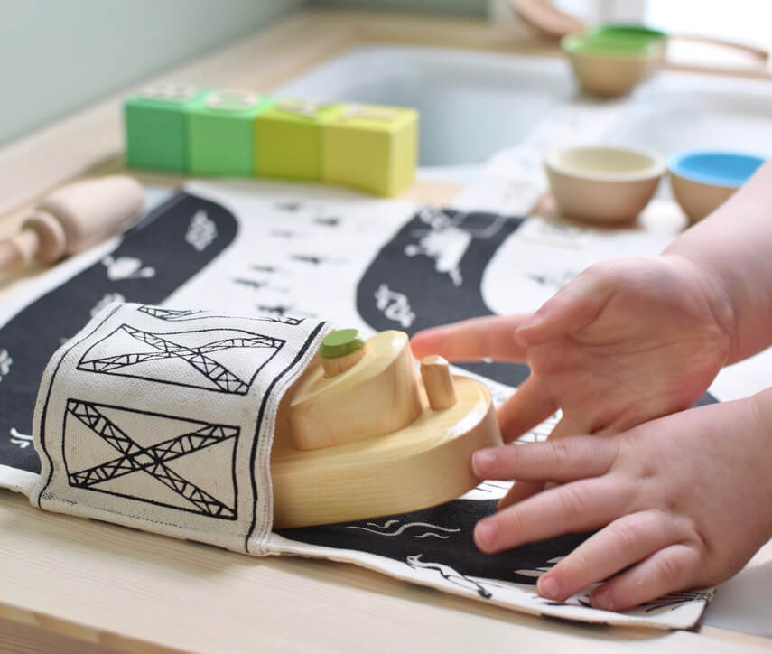 wooden boat and play mat